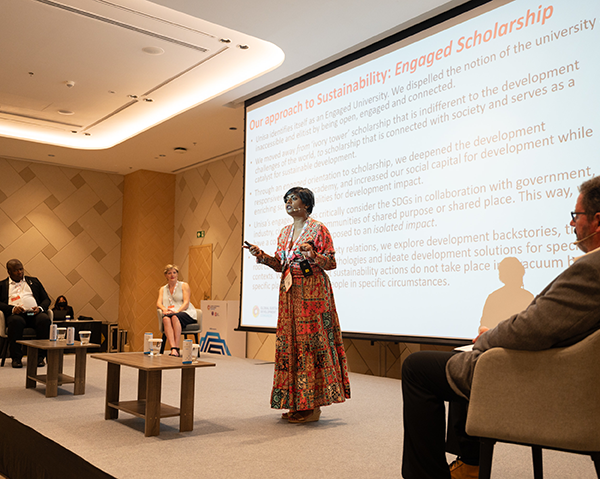 Unisa%20panel%20discussing%20%E2%80%98Giga-scaling%20impact:%20Education,%20gender%20and%20reduced%20inequality%E2%80%99:%20Dr%20Genevieve%20James(standing),%20Herman%20Visser(seated%20on%20the%20right),%20and%20Dr%20Thelma%20Louw%20(seated%20on%20the%20left).%20The%20insightful%20discussions%20on%20the%20topic%20were%20moderated%20by%20Lethlohonolo%20Marumolwa(seated%20on%20the%20far%20left)