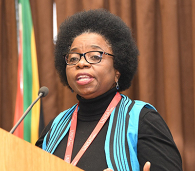 Prof Magano