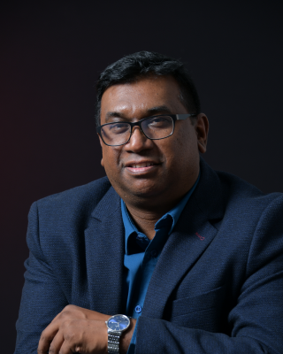 Prof I Naidoo